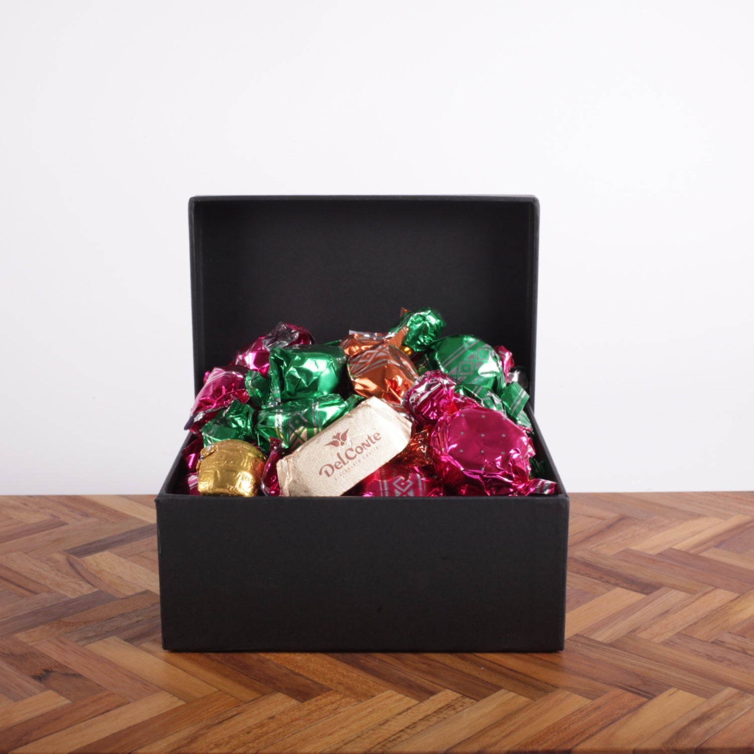 Godter i sort æske 500g