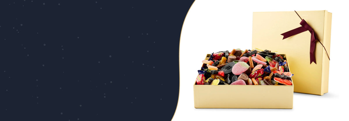 Guldæsker med slik og chokolade