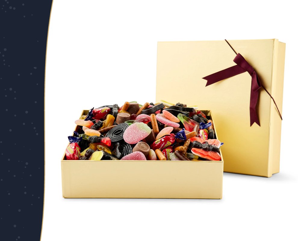 Guldæsker med slik og chokolade