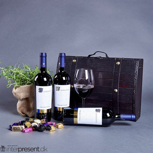 Trækasse med italiensk rødvin og chokolade